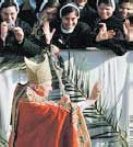 Pope Benedict blessing a congregation.