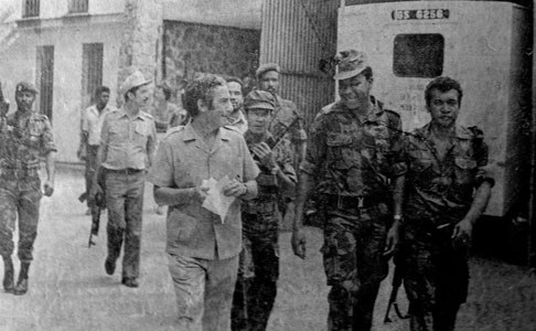 Marxist dictator Rene, chomping a cigar a la Fidel Castro, toured radio Seychelles builing, surrounded by his sycophants.