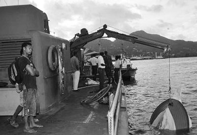 Sunken boat retrieved by the Coast Guard