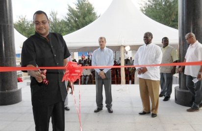 Speaker Herminie cuts the tape to officially open the building. Looking on are President Michel (centre) and Namibian Speaker Dr Gurirab