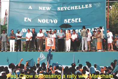 Chow addressing a rally with Mancham