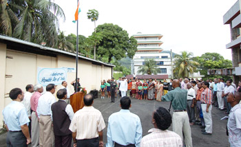 Raising the flag of India at the Indian Embassy.