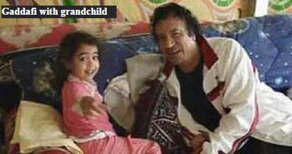 Gadaffi with grandchild