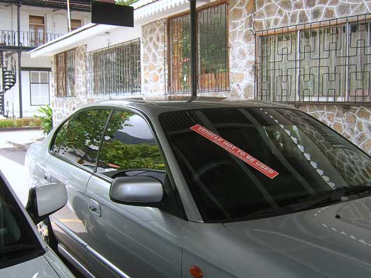 The carbelonging to the Chief Justice with Police ticket on it.