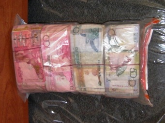 Description: R166,000 seized by the NDEA  on July 13 during an anti-drug operation carried out at Barbarons