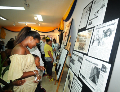 Description: Guests viewing the exhibition