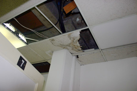 Damage ceiling tiles in Independence House.