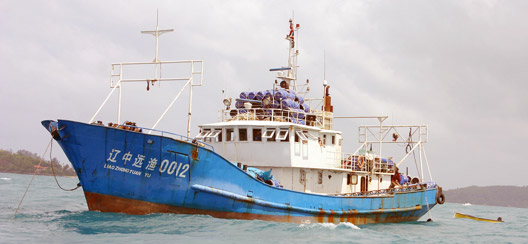 The suspicious Chines fishing boat moored in Victoria harbor.