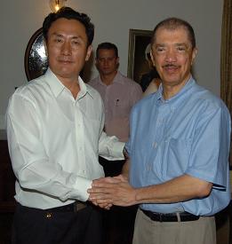 Chinese Ambassor Geng Wenbing bidding farewell to President Michel