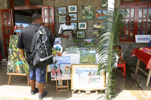 Local artist displaying his creations at the Senpa Fair