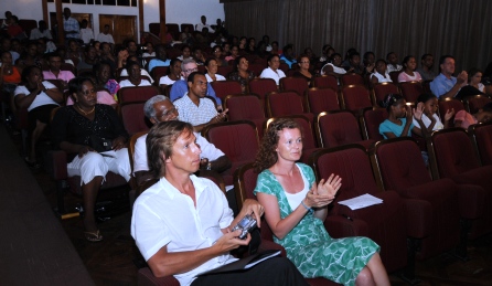 Conductor Holgersson (first left front row) and guests listen to a piece of music performed by the Choir of Our Lady