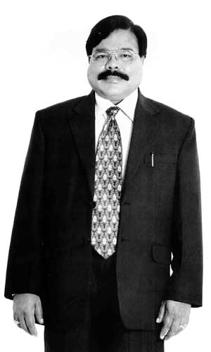 Ramadoss fitted from hair to toe in designer gear - a far cry from when he first stepped on Seychelles soil. 