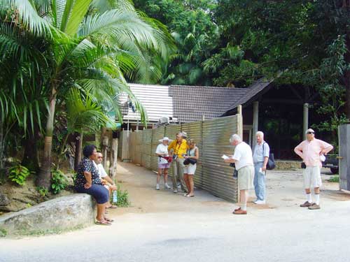 Tourist gathering at the entrance to the Vallee de Mai.