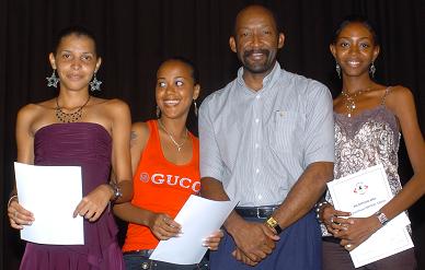 A giggling Minister Meriton with girl winners.