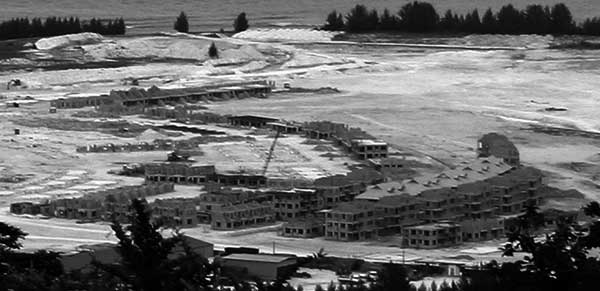 The man-made Ile Perseverance and apartment blocks under construction.